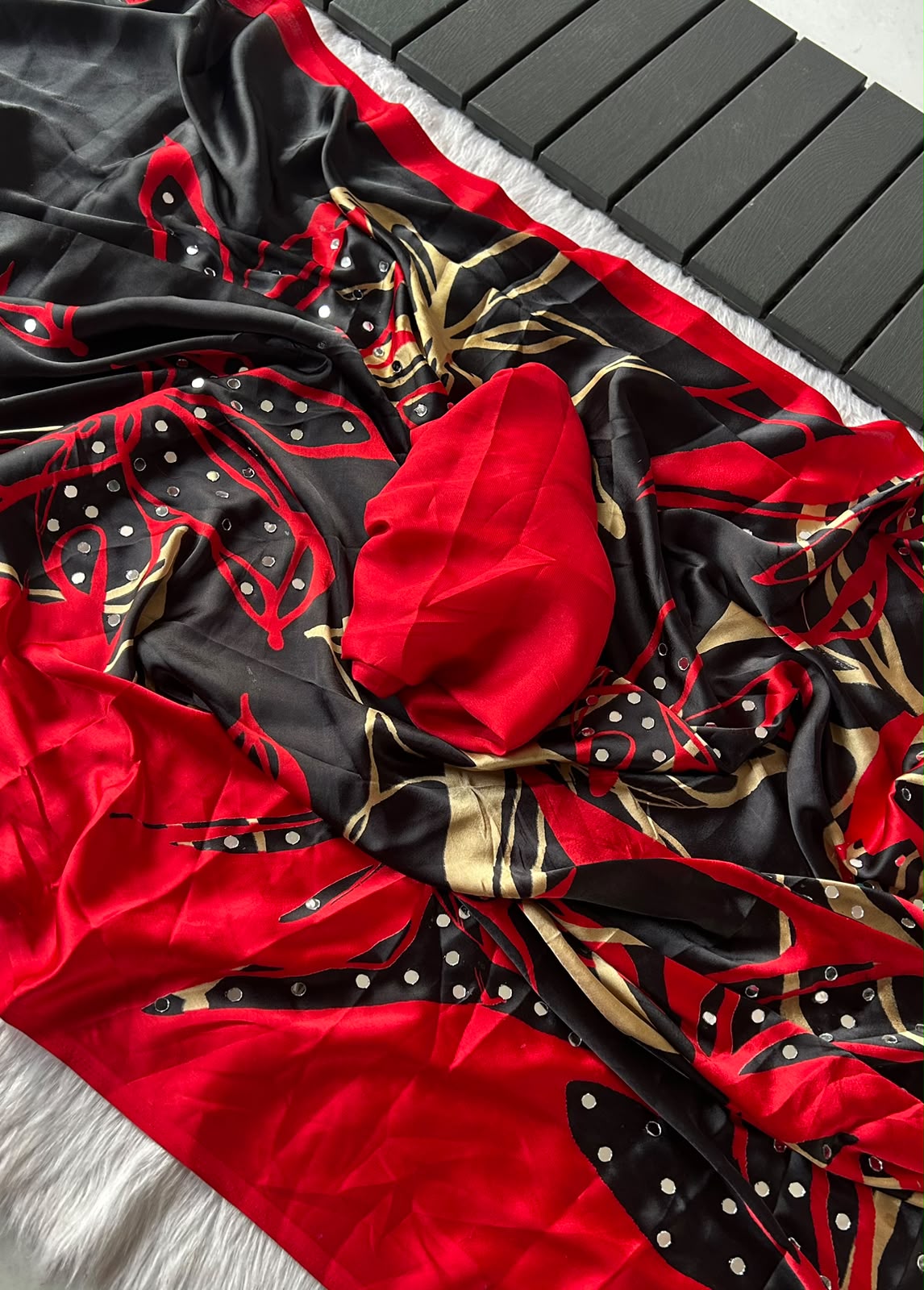 Stain crepe with mirror all over saree with contrast blouse