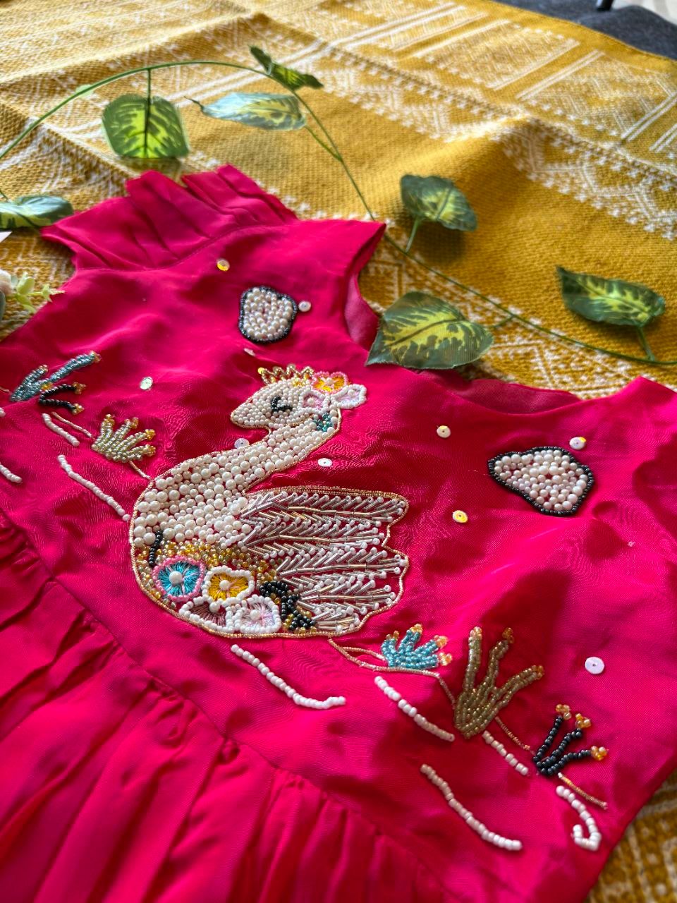 Kids gown with maggam work
