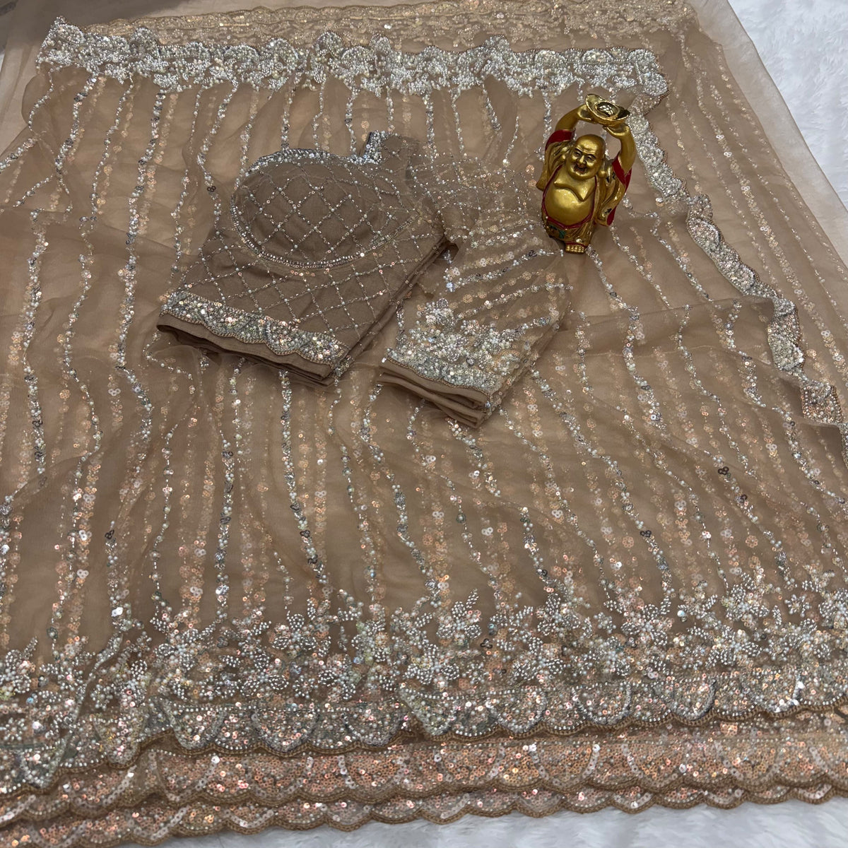 Soft net sarees with pearl work