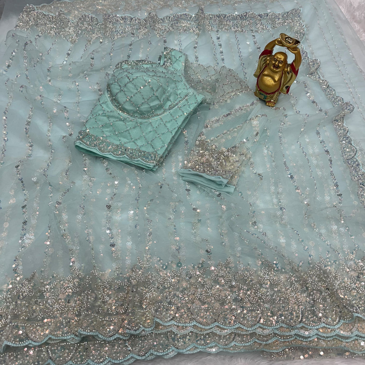 Soft net sarees with pearl work